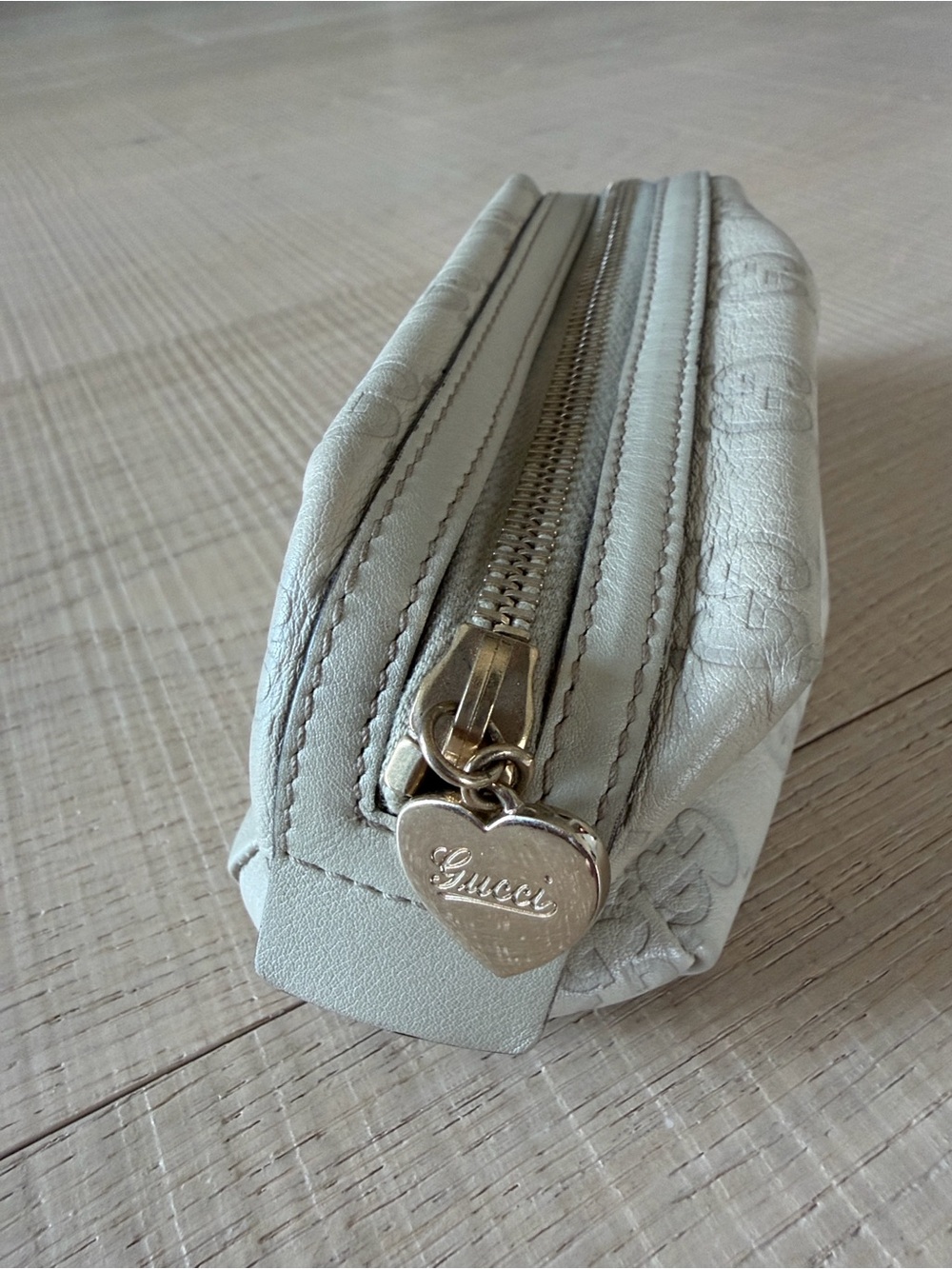 Gucci Guccissima Ivory Leather Zip Cosmetic Pouch with Heart Charm